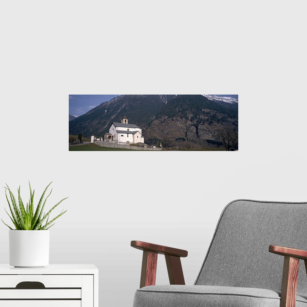 A modern room featuring Church in front of a mountain, Blenio Valley, Ticino, Switzerland