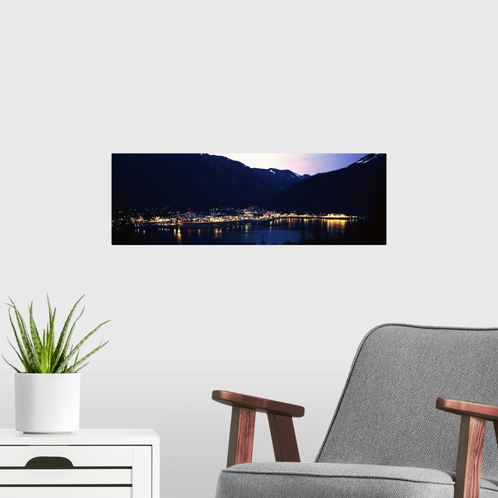 A modern room featuring City lights on harbor, dusk, Juneau, Alaska