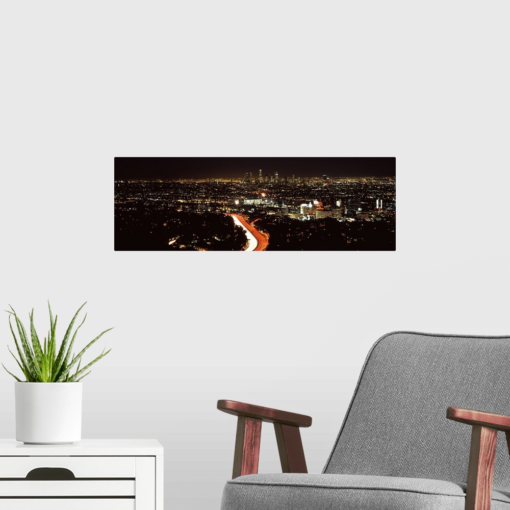 A modern room featuring City lit up at night, Hollywood, City Of Los Angeles, Los Angeles County, California, USA