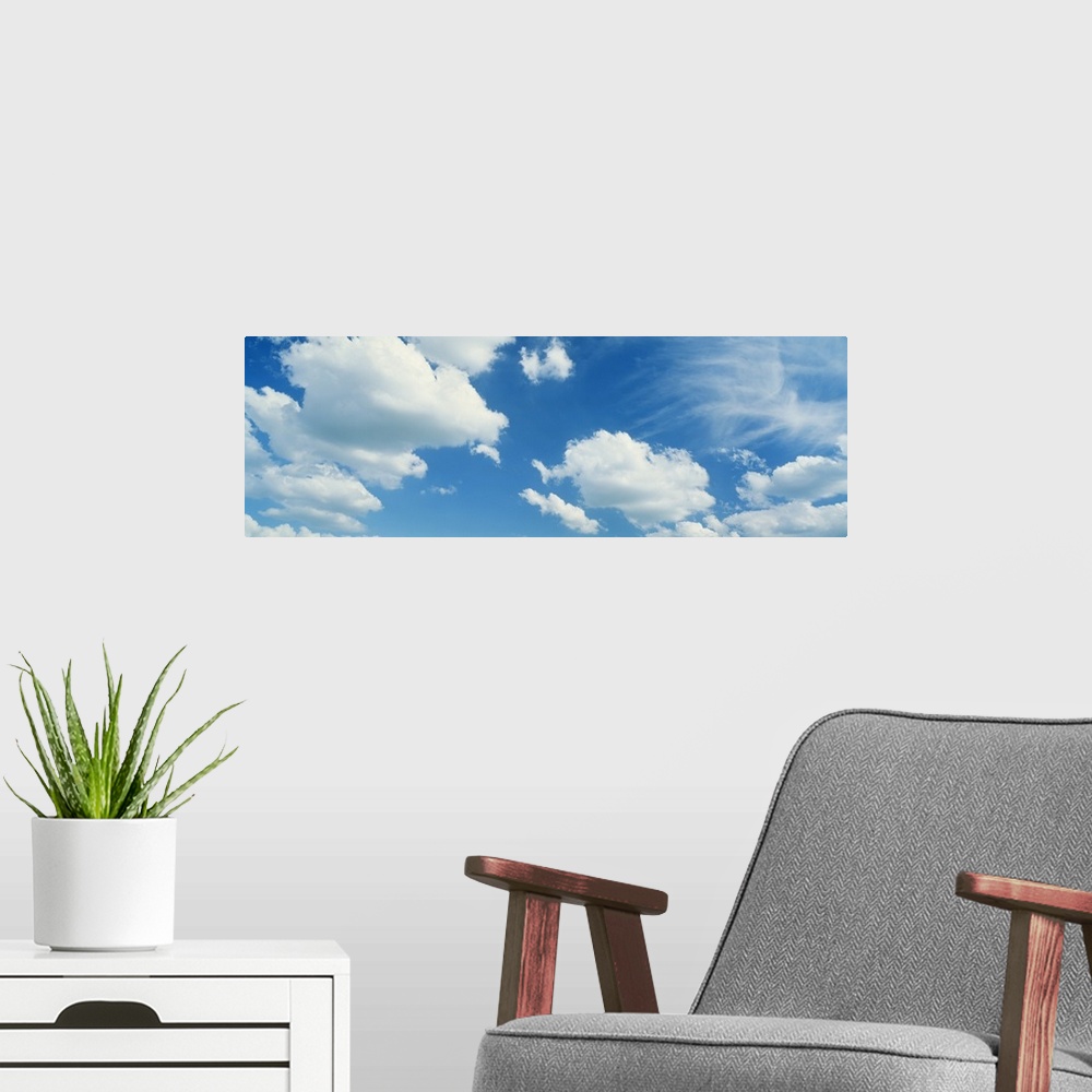 A modern room featuring Clouds