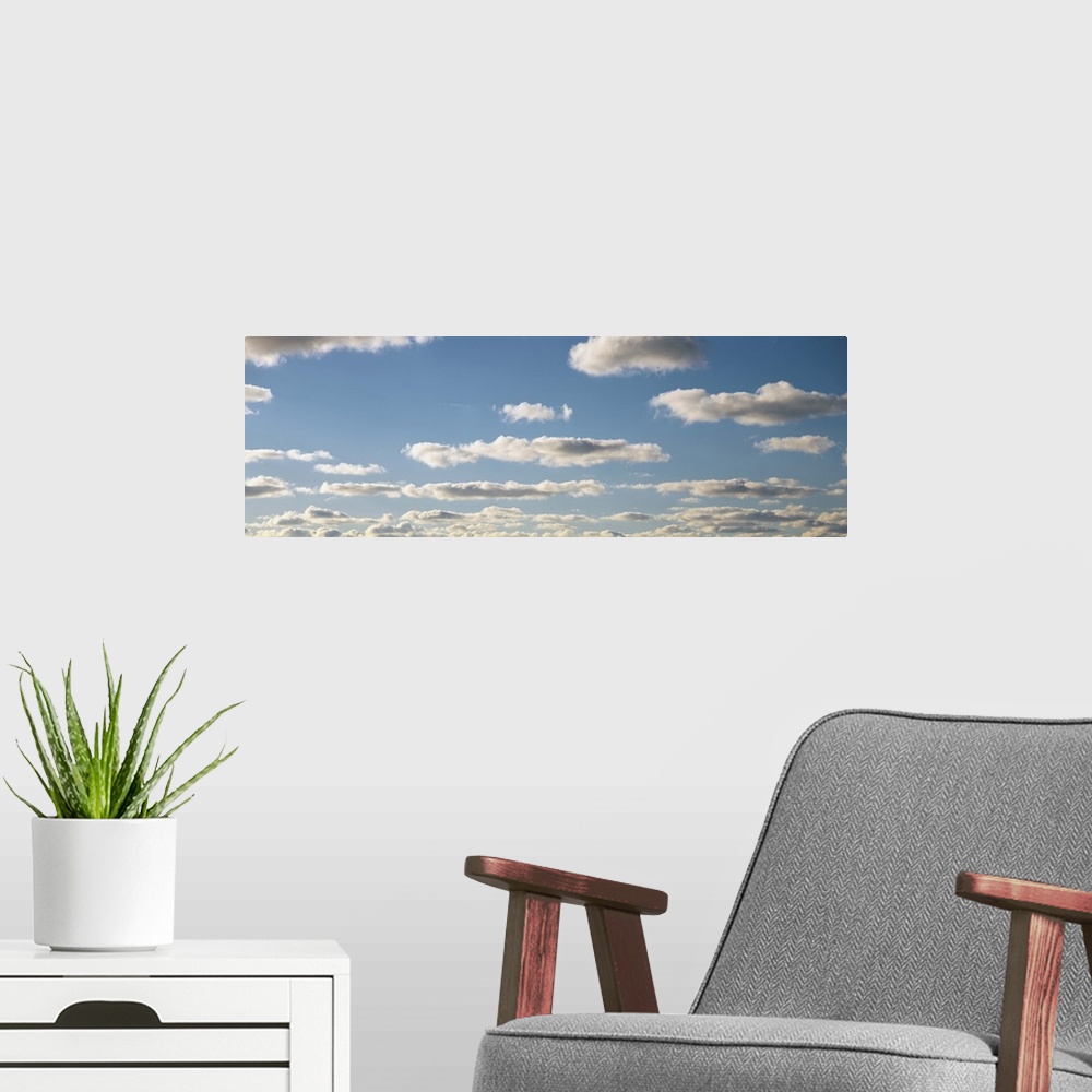 A modern room featuring Clouds and Sky