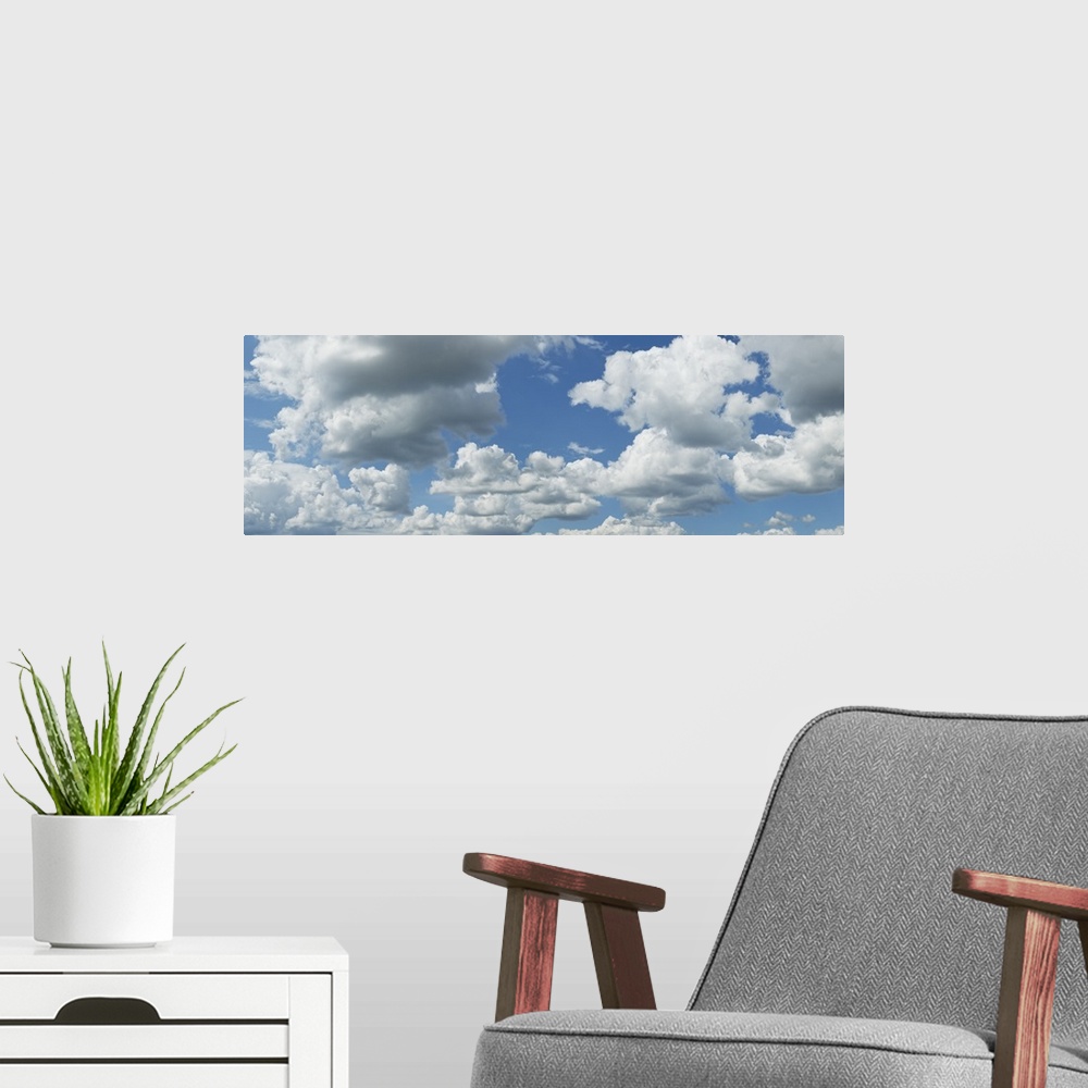A modern room featuring Clouds in the sky