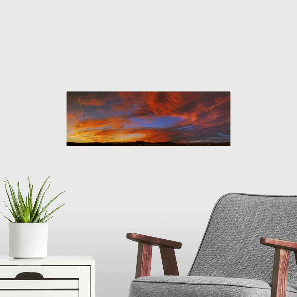 A modern room featuring Clouds in the sky at sunset, Taos, Taos County, New Mexico, USA