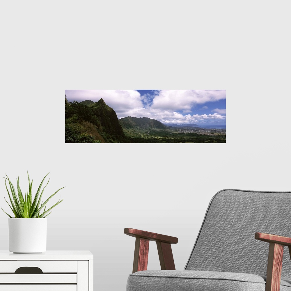 A modern room featuring Clouds over a mountain, Kaneohe, Oahu, Hawaii