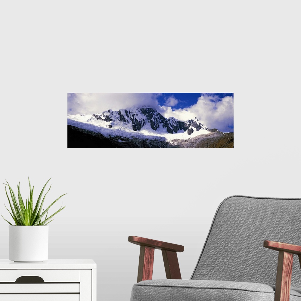 A modern room featuring Clouds over snowcapped Andes, Cusco Region, Peru, South America