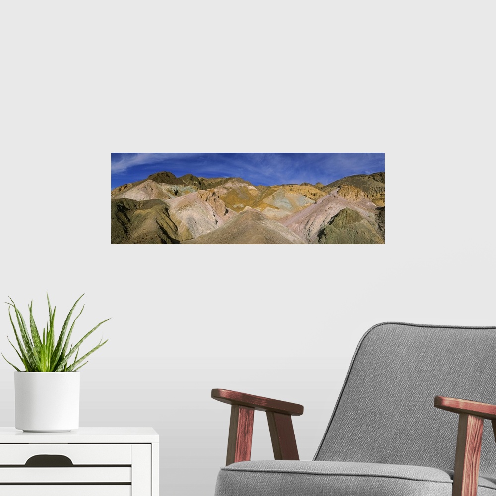 A modern room featuring Colorful mountains on a mountain range, Artists Palette, Death Valley National Park, California