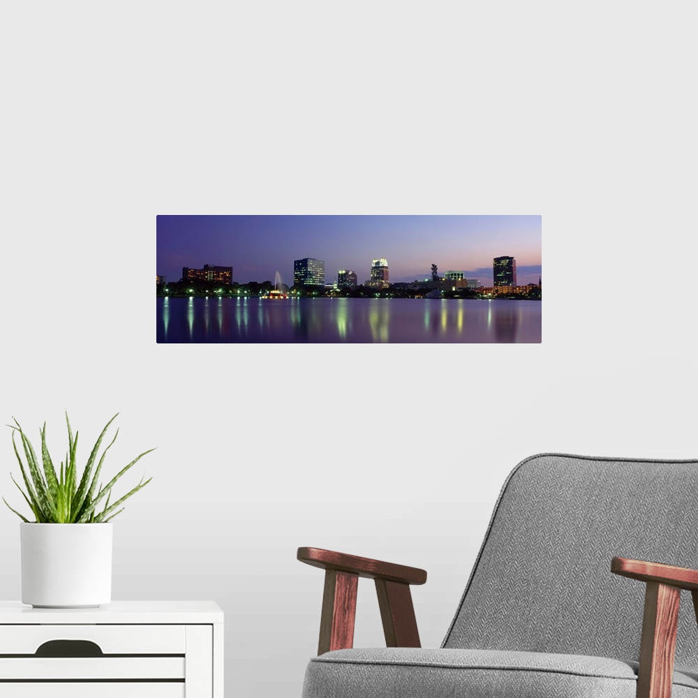 A modern room featuring Evening Skyline Lake Eola Orlando FL