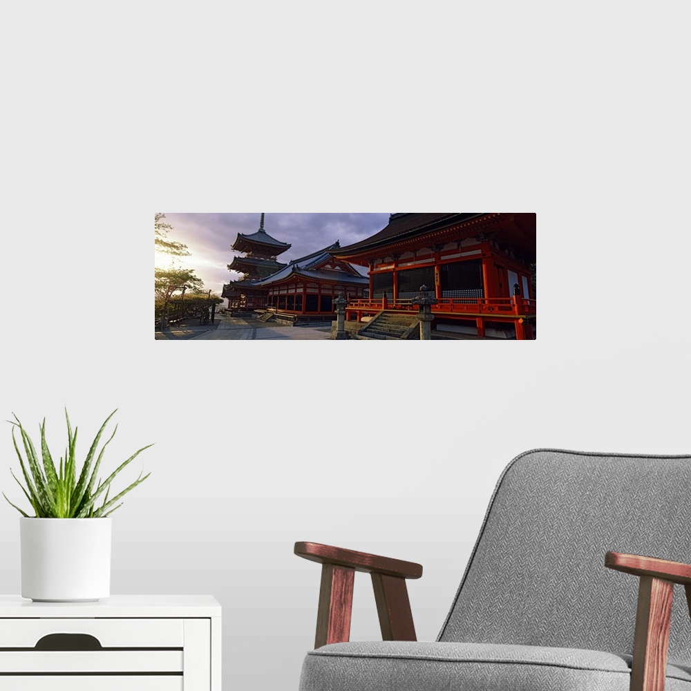 A modern room featuring Panoramic photograph on a giant canvas of the Kiyomizu-Dera Temple, shadowed as the sun sets in t...
