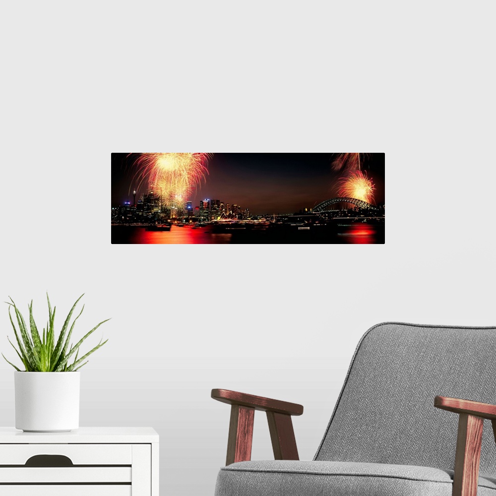 A modern room featuring Firework display at New year's eve in a city, Sydney, New South Wales, Australia