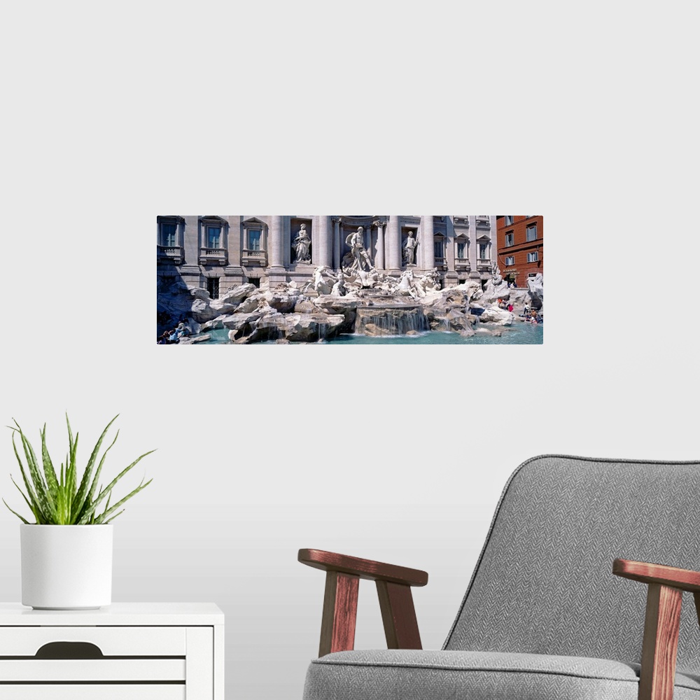 A modern room featuring Fountain in front of a building, Trevi Fountain, Rome, Italy