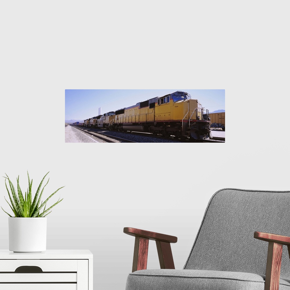 A modern room featuring Freight train on railroad tracks, California