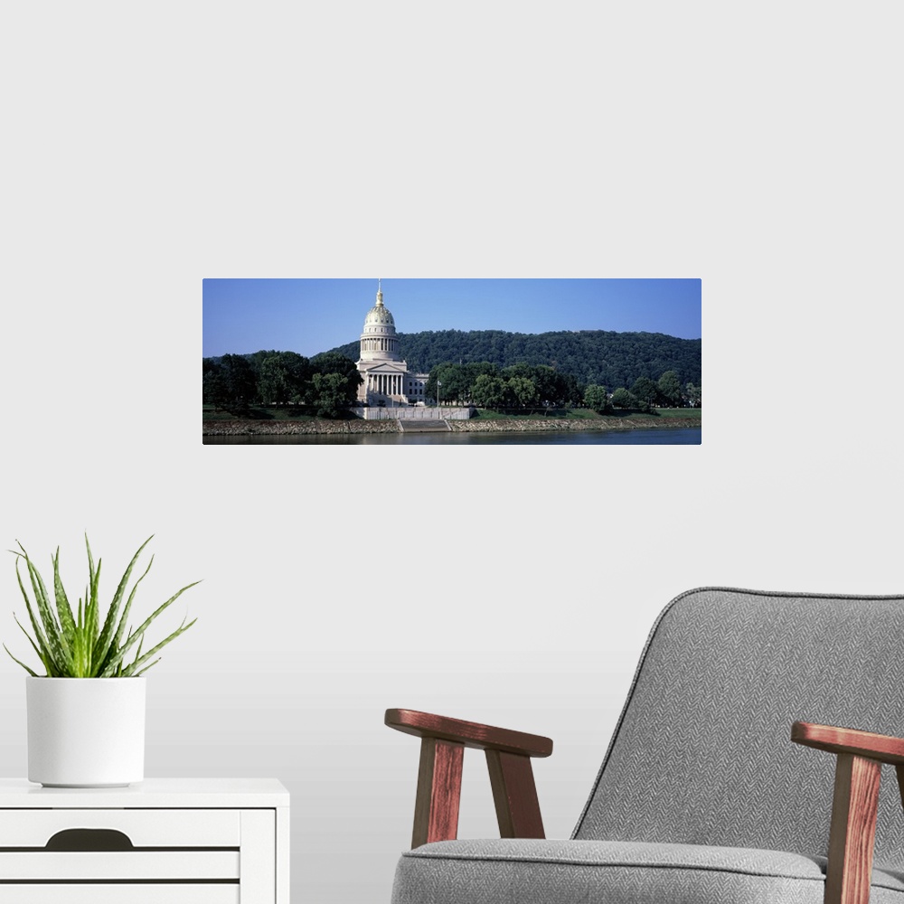 A modern room featuring Government building at the riverside West Virginia State Capitol Kanawha River Charleston West Vi...