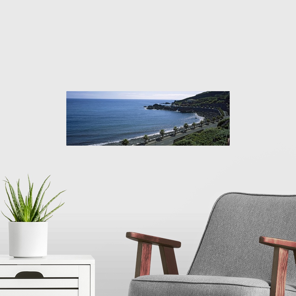 A modern room featuring High angle view of a road along the coast, Seixal, Madeira, Portugal