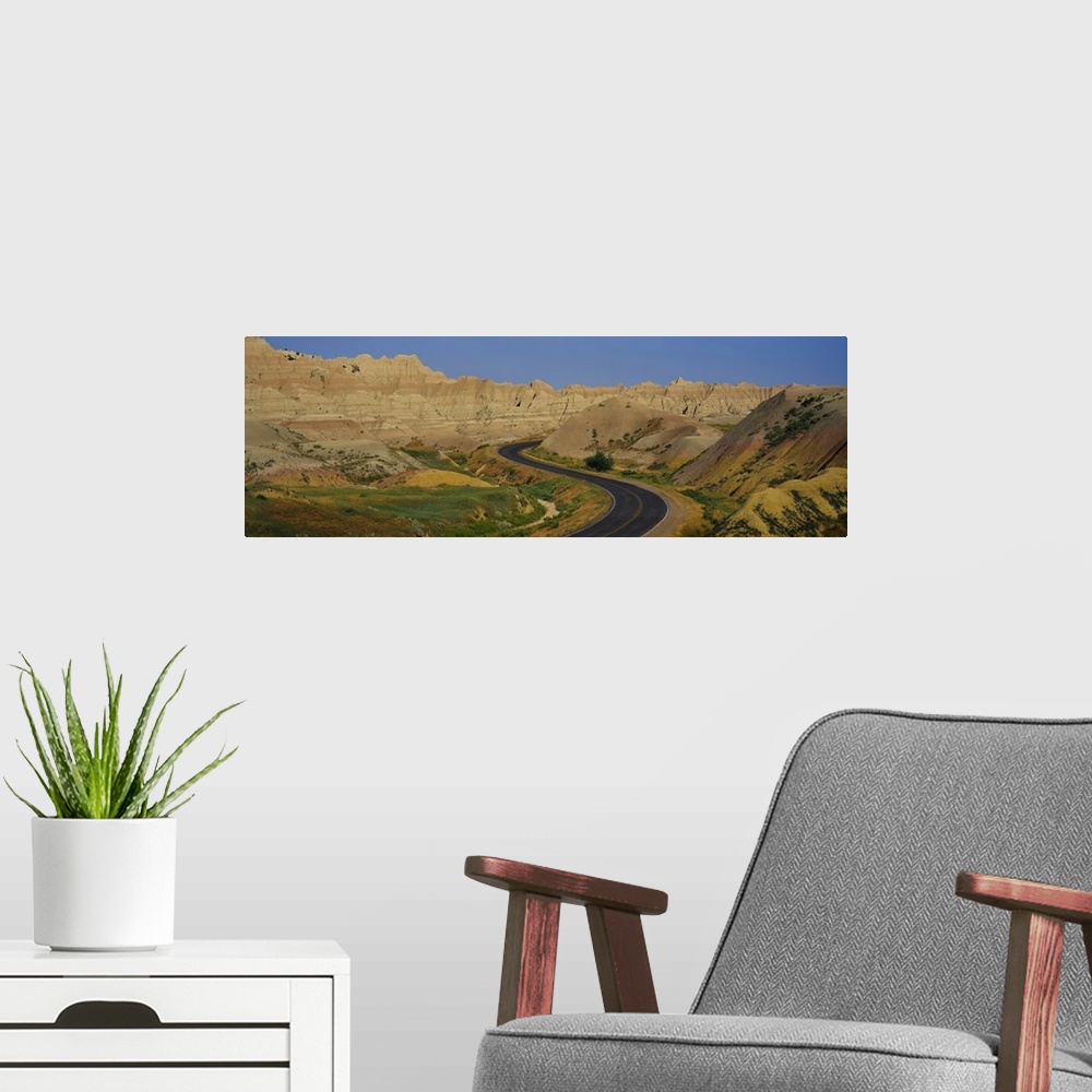 A modern room featuring High angle view of a road passing through a landscape, Badlands National Park, South Dakota