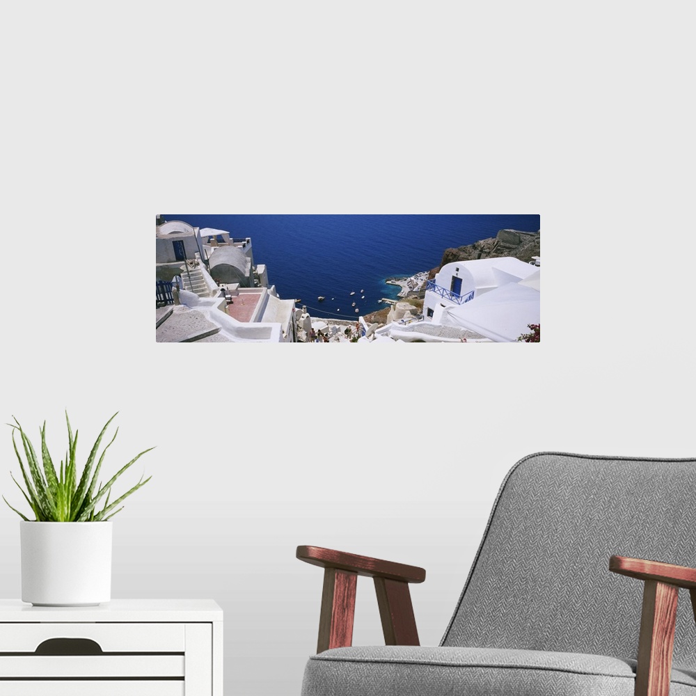 A modern room featuring High angle view of buildings, Ammoudi Bay, Oia, Santorini, Greece