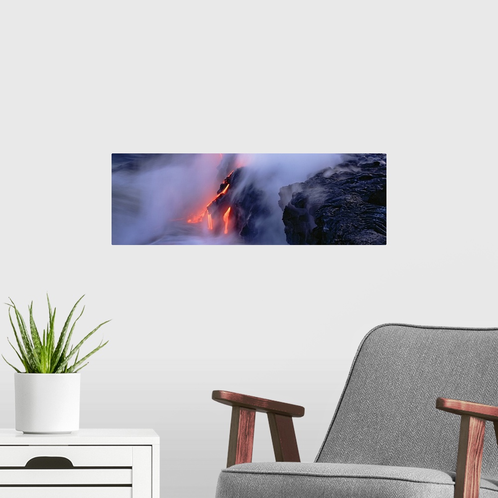 A modern room featuring High angle view of lava flowing into the Pacific Ocean, Volcano National Park, Hawaii