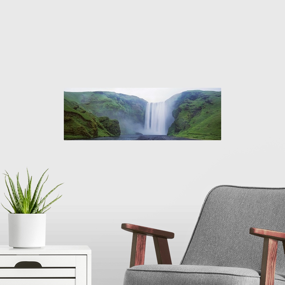 A modern room featuring Iceland, Skogar, Skogafoss Waterfall, Panoramic view of a waterfall