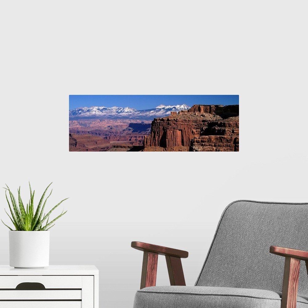A modern room featuring La Sal Mountains seen from Canyonlands National Park Utah