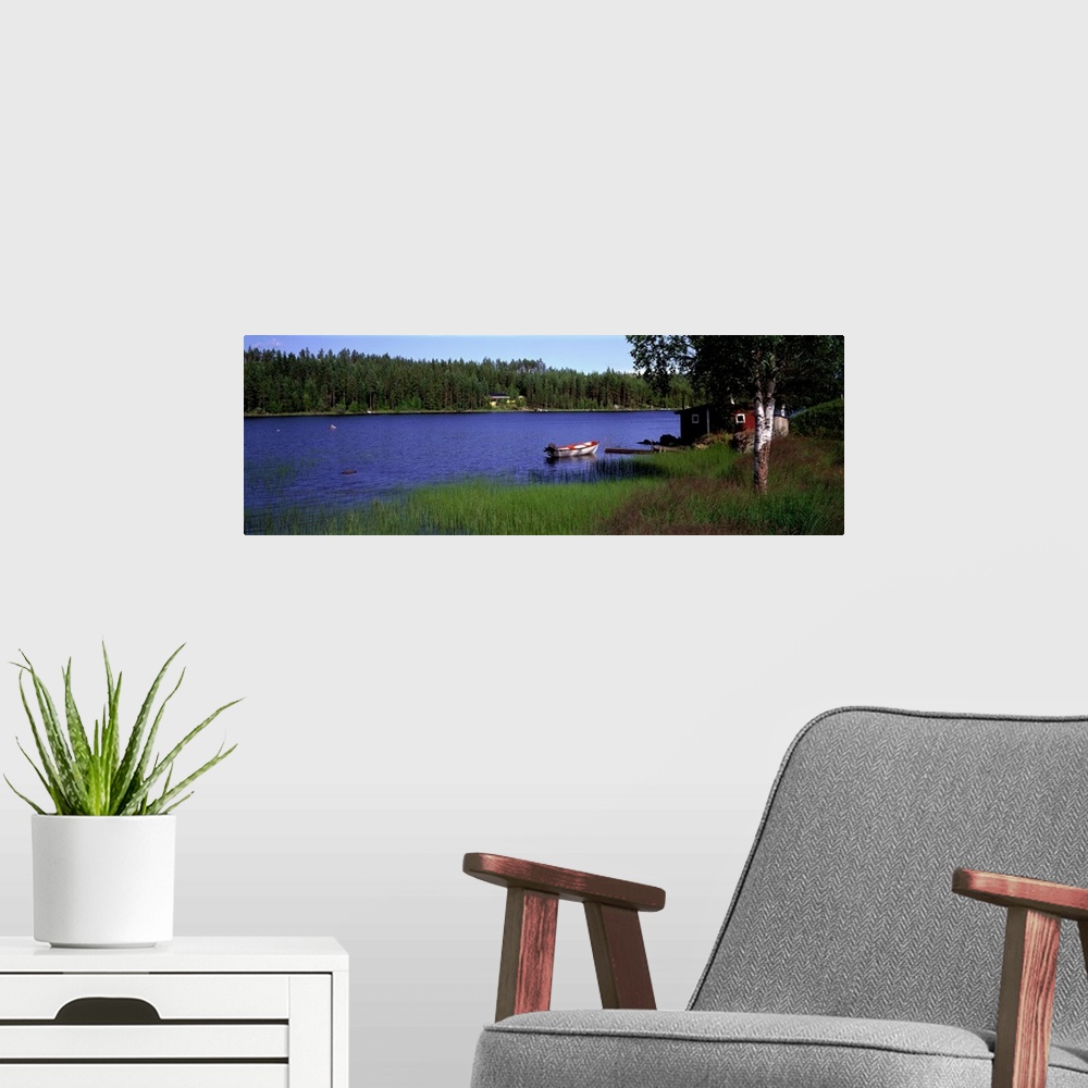 A modern room featuring Lake with Cabin and Boat, near Falun, Dalarna, Sweden
