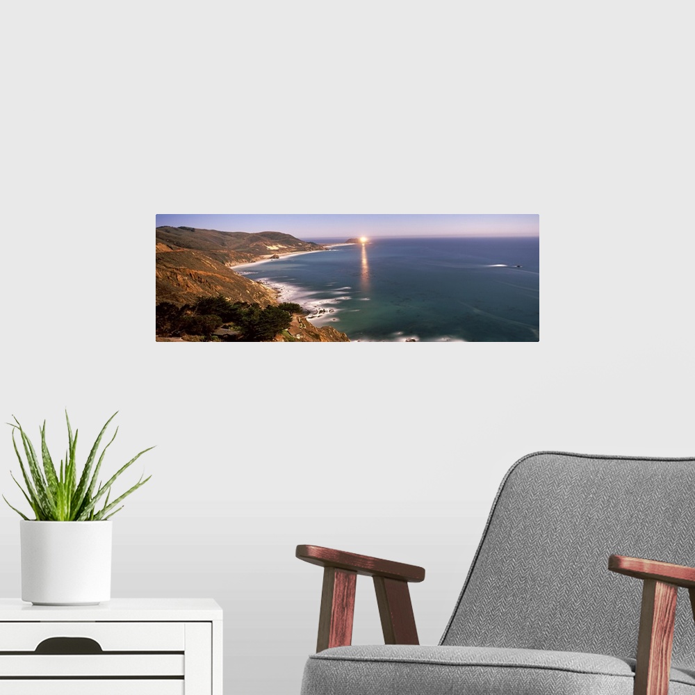 A modern room featuring Lighthouse lit up at night, Big Sur, California,