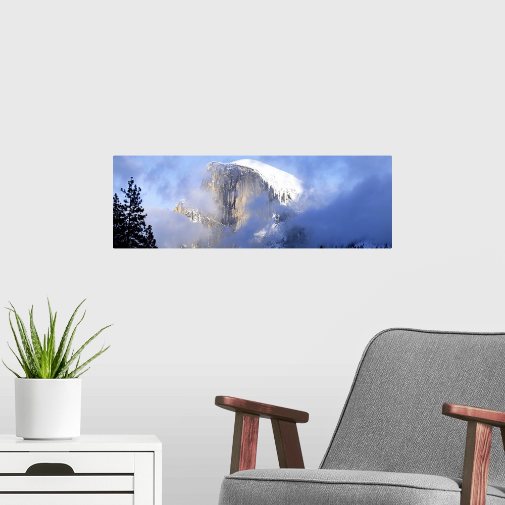 A modern room featuring Low angle view of a mountain covered with snow, Half Dome, Yosemite National Park, California