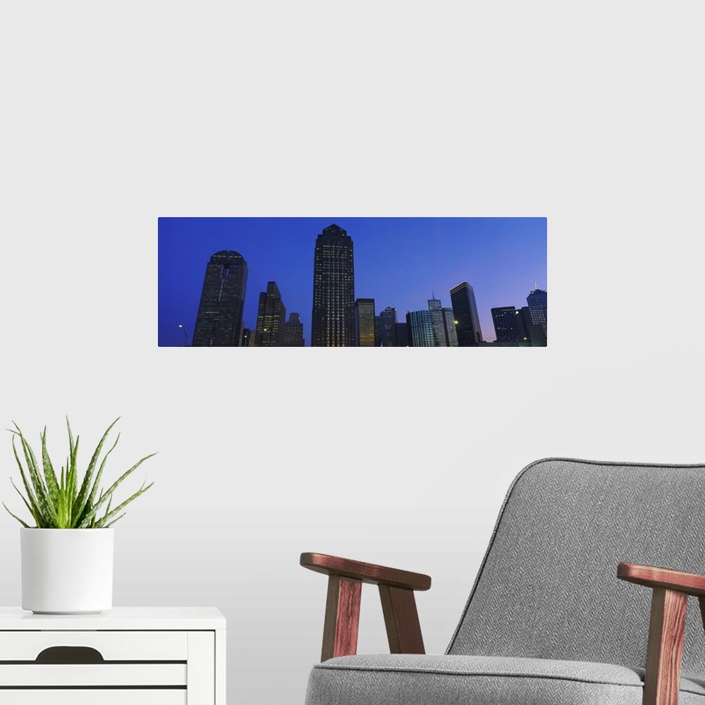 A modern room featuring Low angle view of buildings at dusk, Dallas, Texas