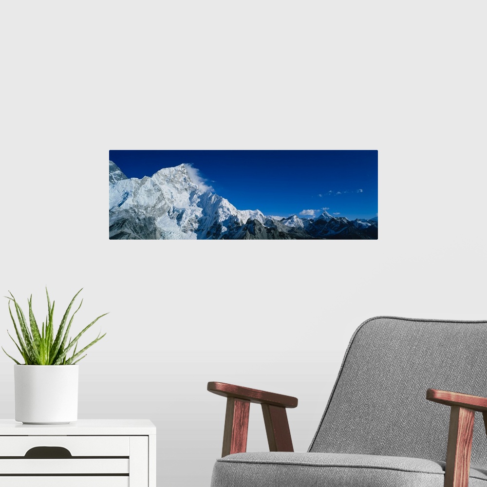 A modern room featuring Low angle view of mountains covered with snow, Himalaya Mountains, Khumba Region, Nepal