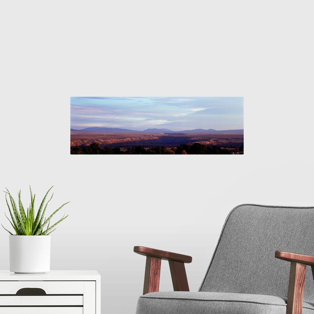 A modern room featuring Mountains on a landscape, Rio Grande Gorge, Taos, New Mexico