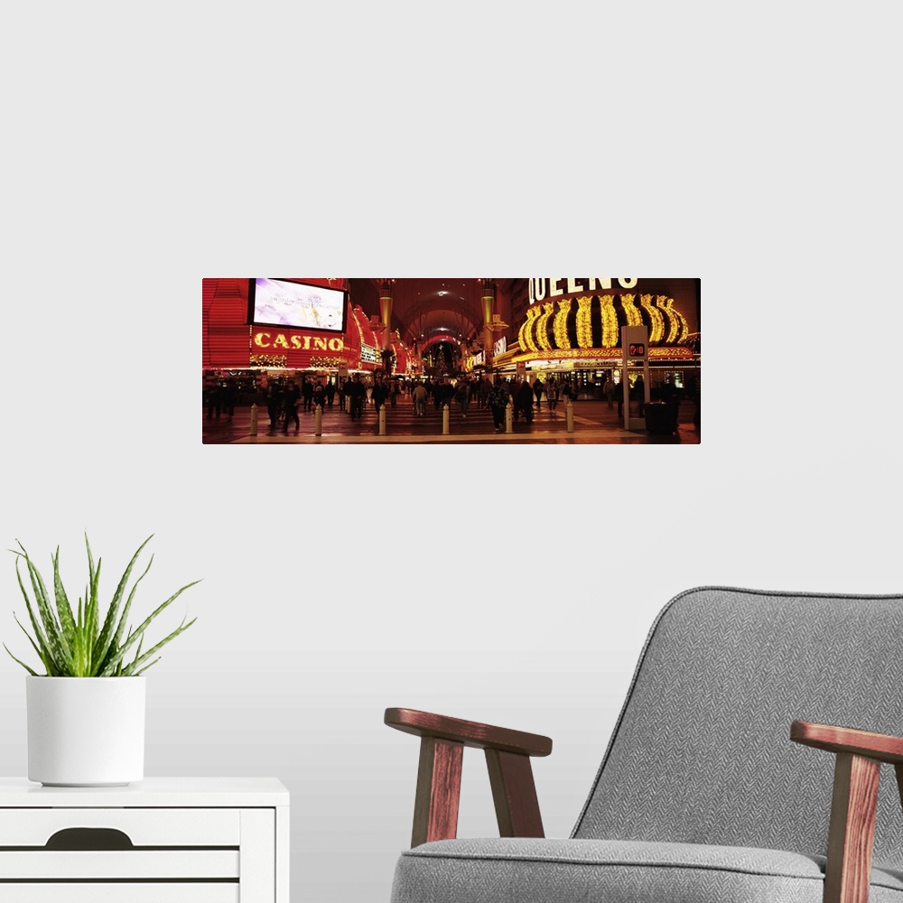 A modern room featuring Nevada, Las Vegas, The Fremont Street, Large group of people at a market street
