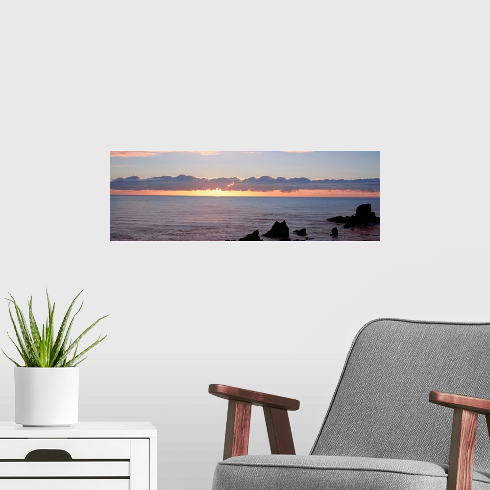 A modern room featuring Oregon, Pacific Ocean, sunset