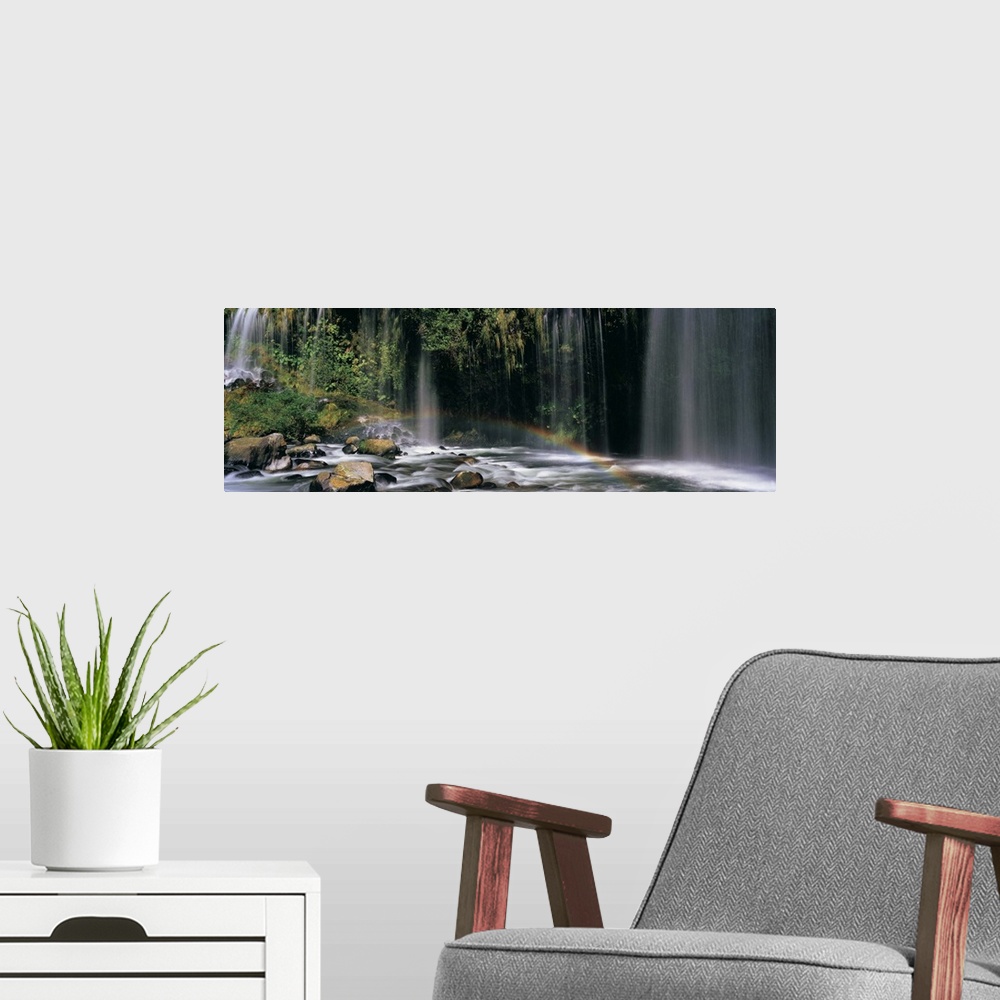 A modern room featuring Rainbow in front of a waterfall in a forest, Dunsmuir, Siskiyou County, California