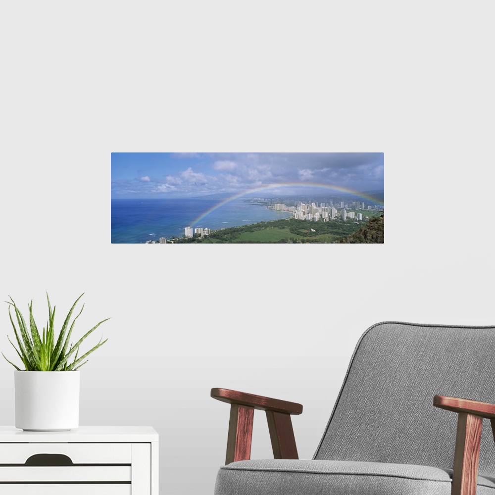 A modern room featuring Rainbow over a city, Waikiki, Honolulu, Oahu, Hawaii