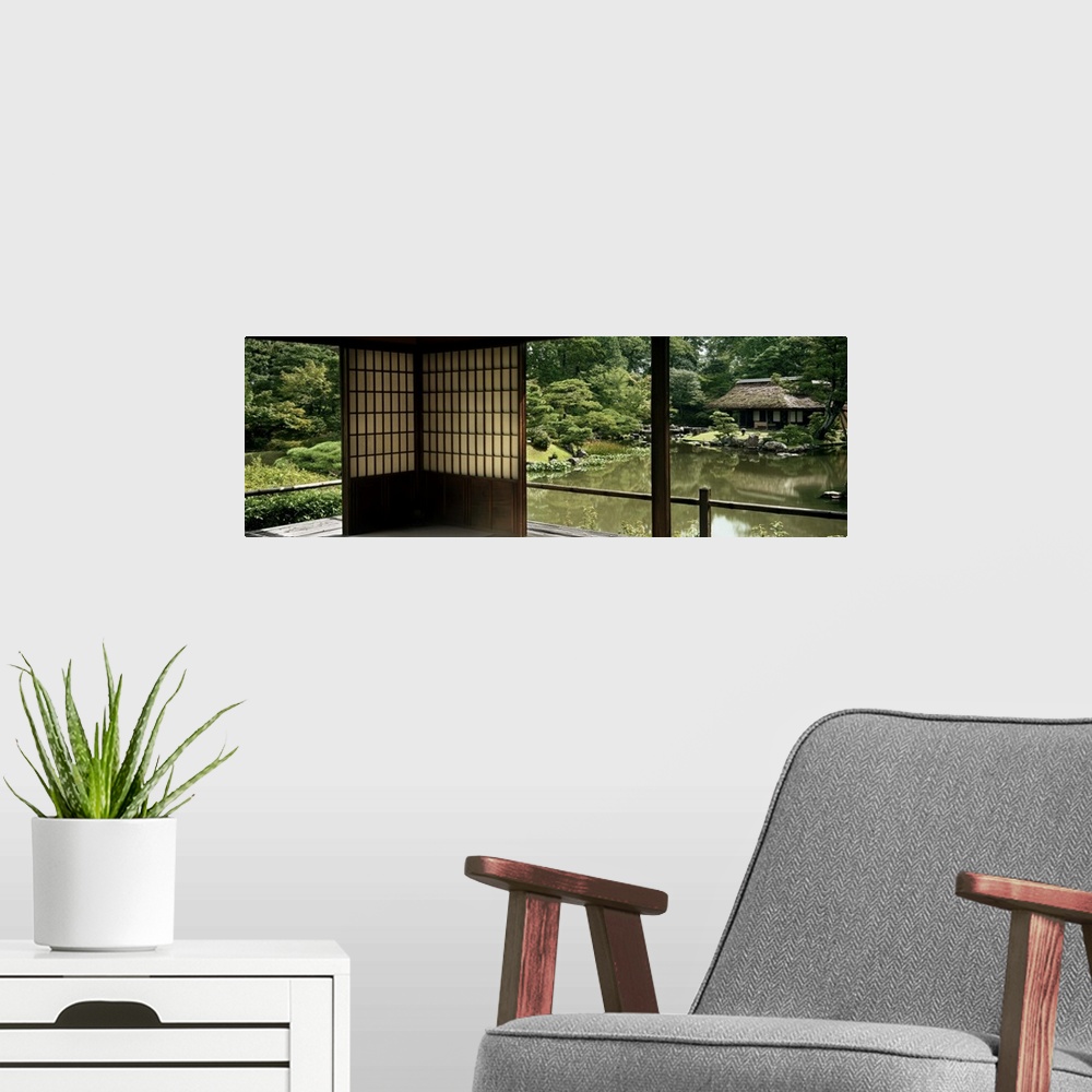 A modern room featuring Reflection of a house and trees on water, Katsura Imperial Villa, Kyoto, Japan