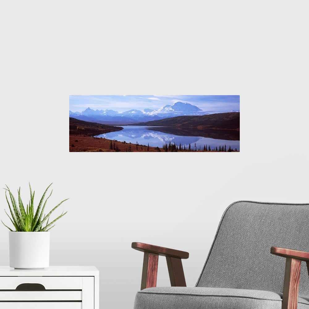 A modern room featuring Reflection of a mountain range in a lake, Mt McKinley, Wonder Lake, Denali National Park, Alaska,