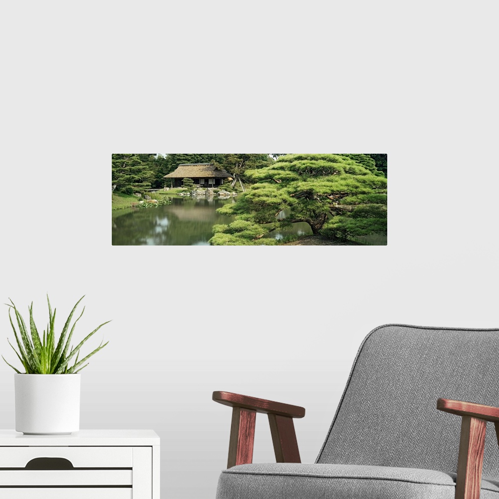 A modern room featuring Reflection of trees in water, Tea House, Imperial Gardens, Kyoto Prefecture, Honshu, Japan