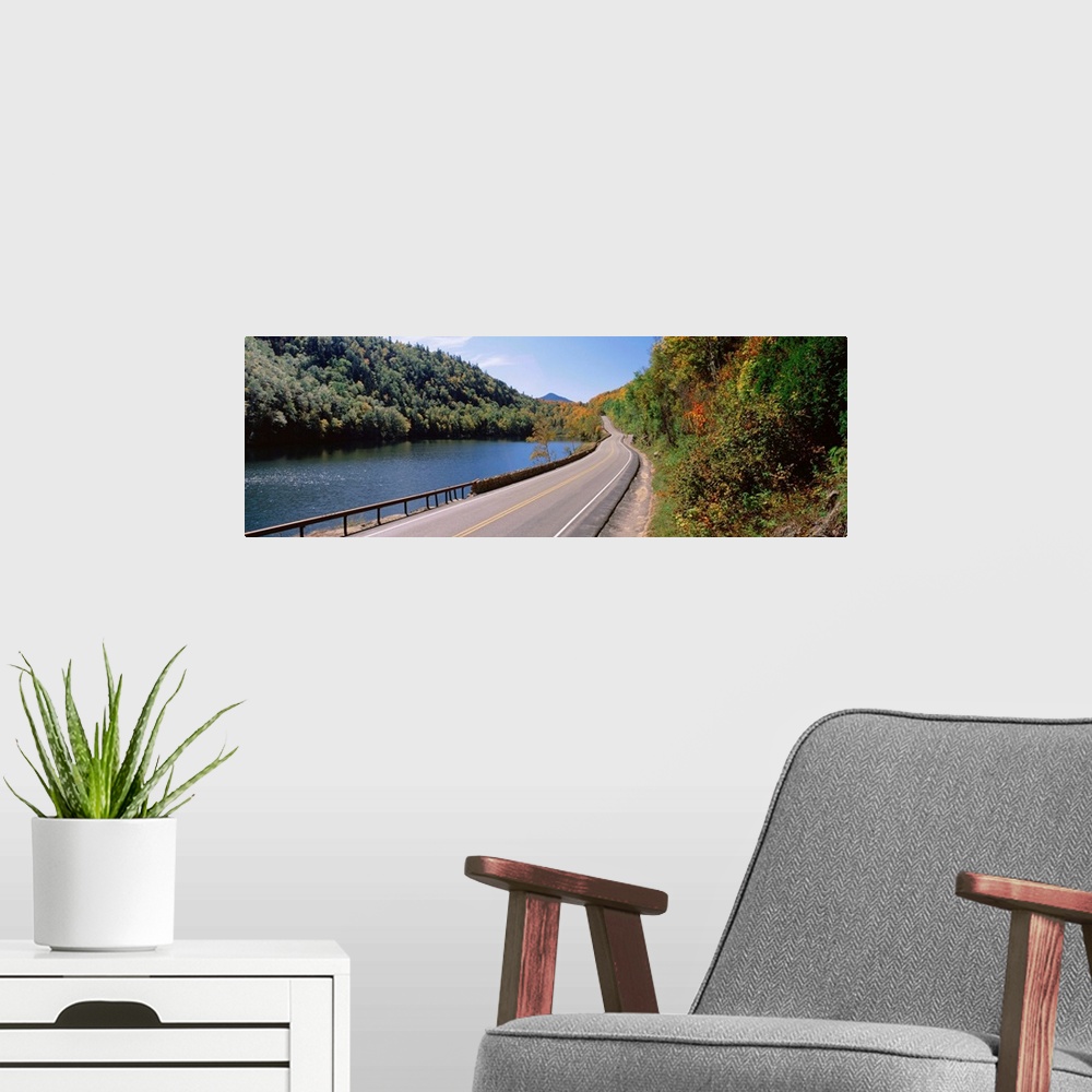 A modern room featuring Road passing through a landscape, Route 73, Cascade Lakes, Adirondack Mountains, Keene, New York ...