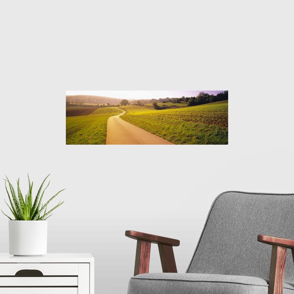 A modern room featuring Road passing through a rolling landscape, Baden-Wurttemberg, Germany