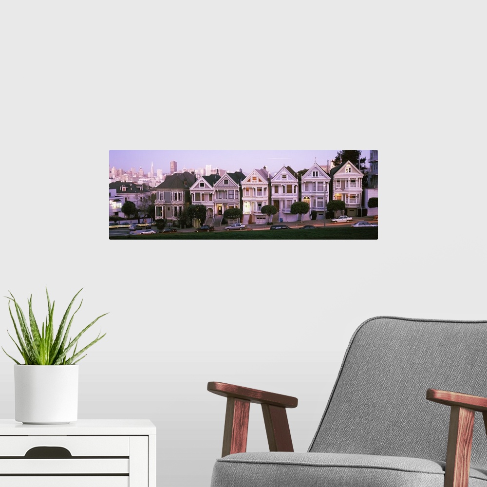 A modern room featuring Row houses in a city, Postcard Row, The Seven Sisters, Painted Ladies, Alamo Square, San Francisc...