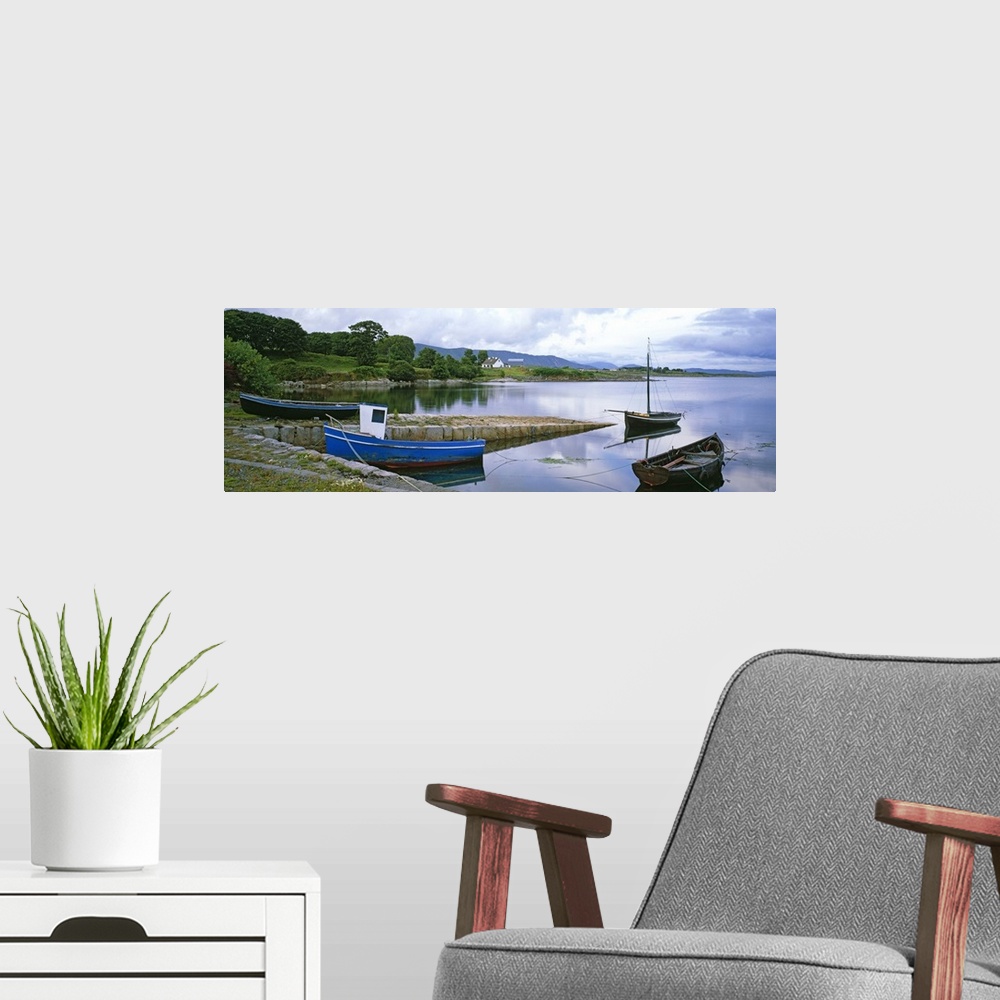 A modern room featuring Seascape with boats in harbor, Ireland