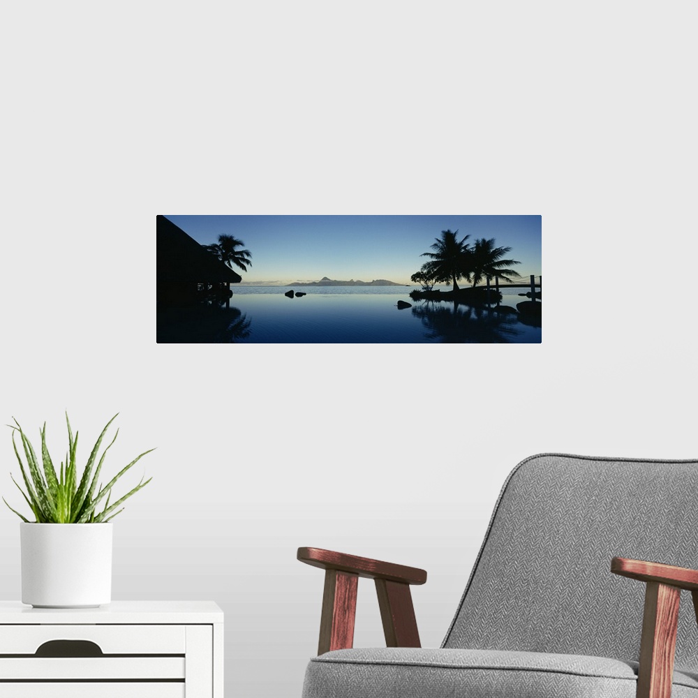 A modern room featuring Silhouette of a tourist resort, Tahiti Beachcomber Resort, Papeete, Tahiti, French Polynesia