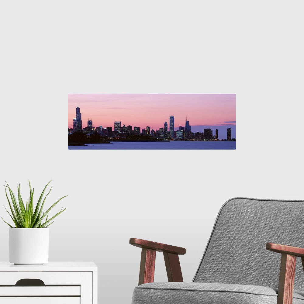 A modern room featuring Silhouette of buildings at dusk, Chicago, Illinois