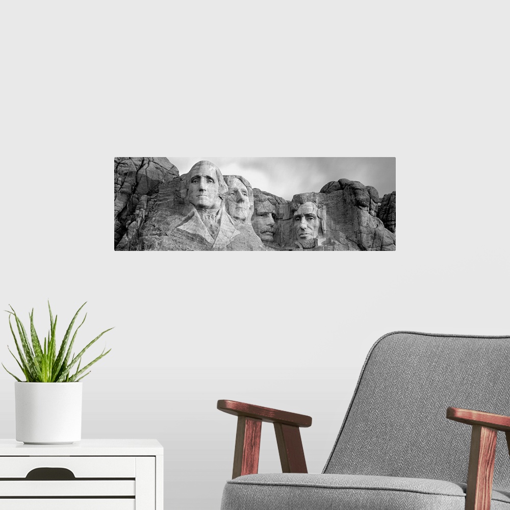 A modern room featuring Black and white panorama of Mount Rushmore, a granite sculpture in South Dakota that took 14 year...