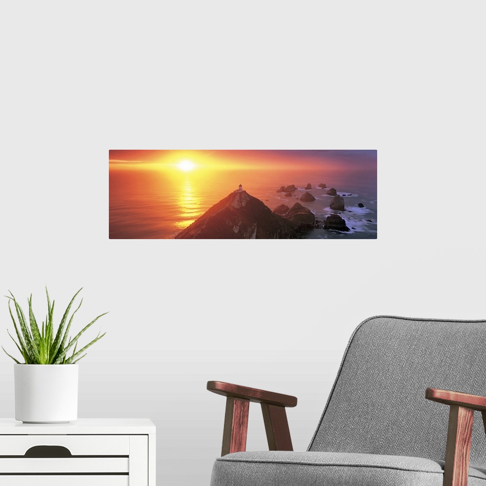 A modern room featuring Sunset Nugget Point Lighthouse New Zealand