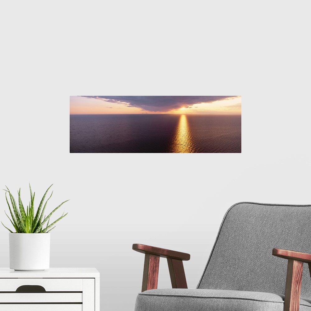 A modern room featuring Sunset over a lake, Lake Michigan, Michigan