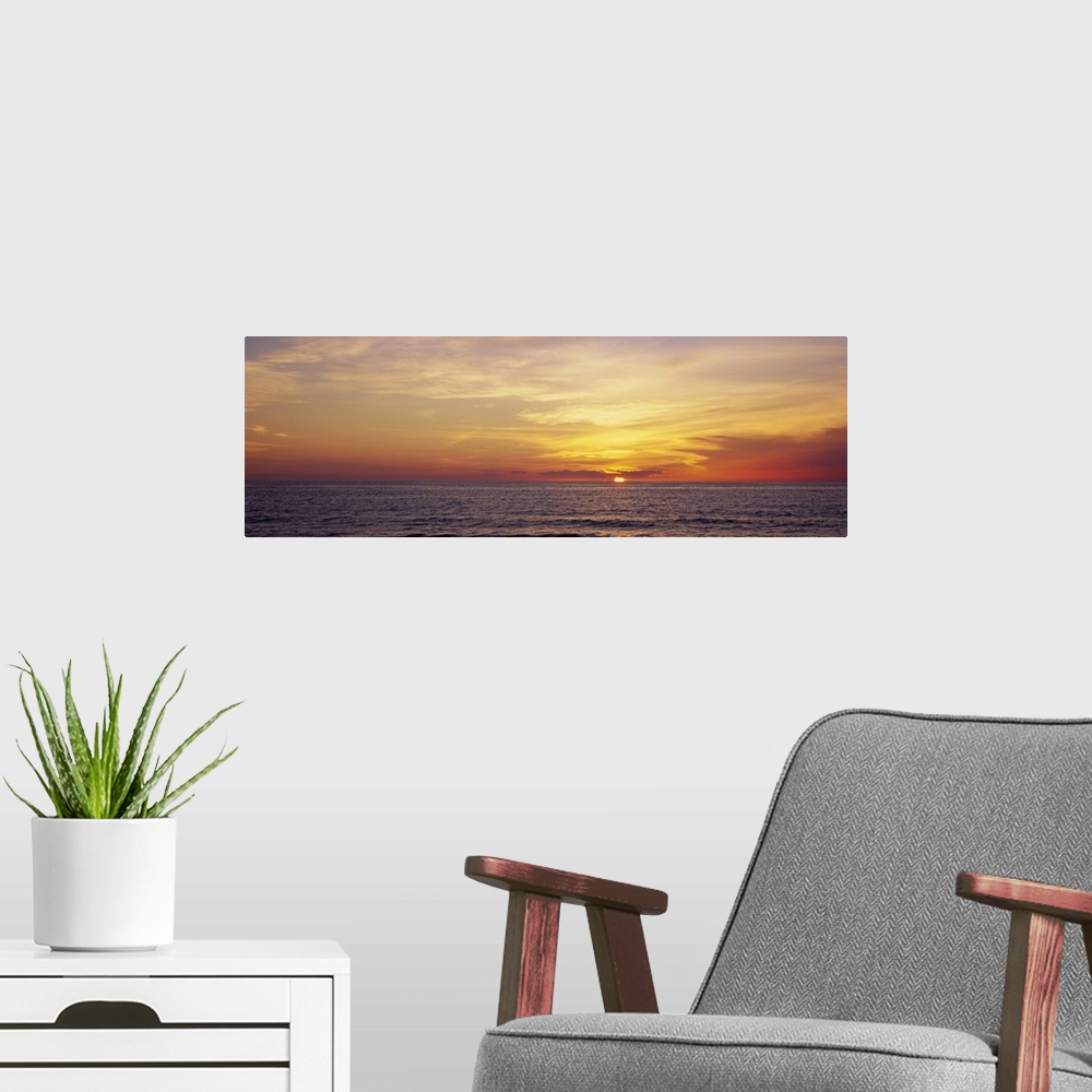 A modern room featuring Sunset over the sea, Gulf Of Mexico, Venice, Sarasota County, Florida