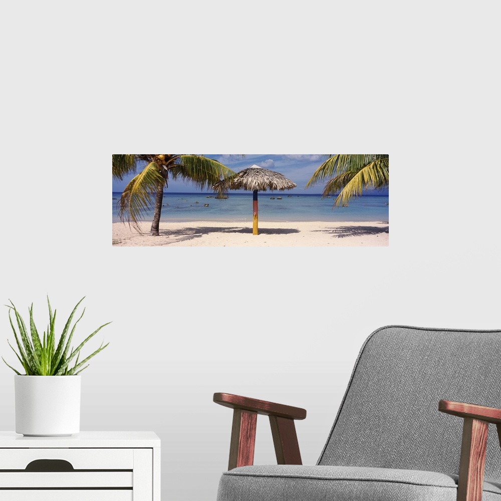 A modern room featuring Sunshade on the beach La Boca Cuba