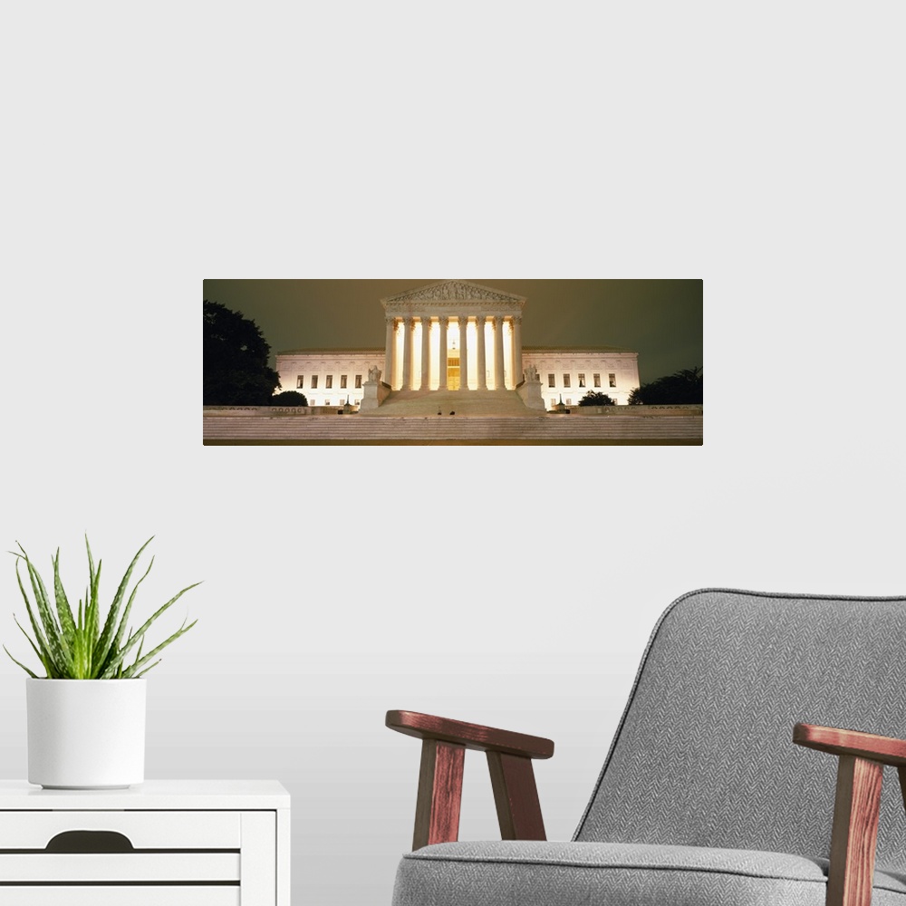 A modern room featuring Large, panoramic, low angle photograph of the Supreme Court Building in Washington DC, brightly l...