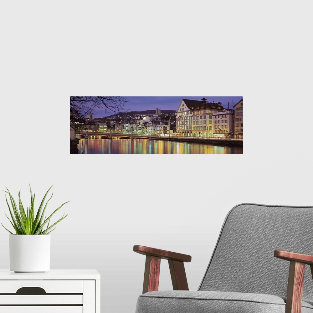 A modern room featuring Switzerland, Zurich, River Limmat, view of buildings along a river