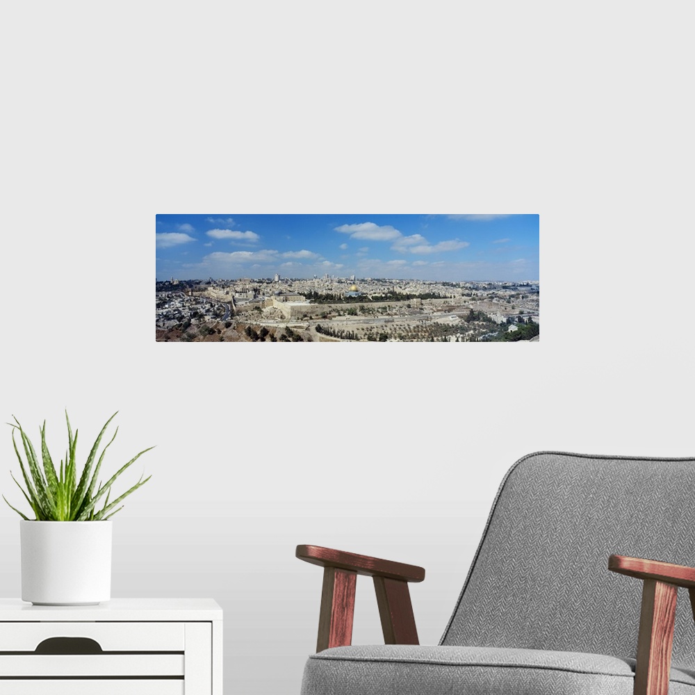 A modern room featuring Panoramic photograph of the ""Holy City"" located on a plateau in the Judean Mountains between th...