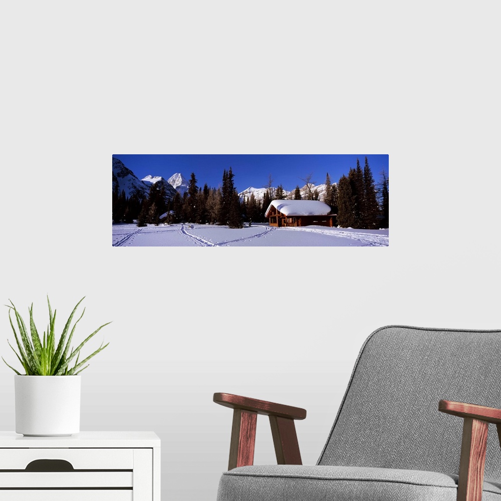 A modern room featuring Tourist lodge in a snow covered field, Naiset Cabins and Huts, Mt Assiniboine Provincial Park, Br...